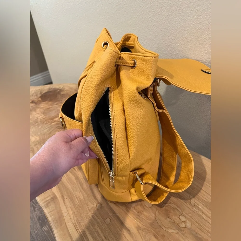 Yellow Textured Pleather Backpack with Silver Clasp